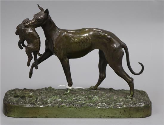 A cast iron (not bronze) figure of a greyhound holding a hare height 16cm